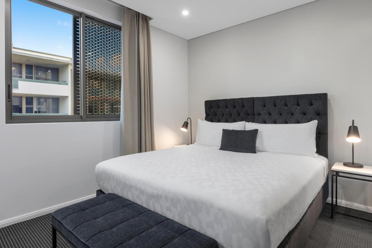 赖德北梅里顿公寓式酒店 悉尼 外观 照片 A bedroom at the hotel